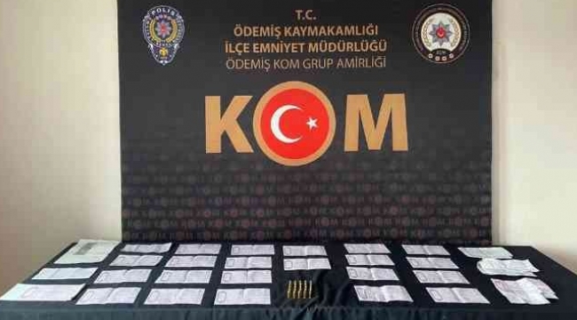İzmir'de tefecilik yapan bir kişi gözaltına alındı