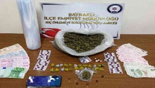 Polisi görünce uyuşturucu dolu poşeti aşağı attılar