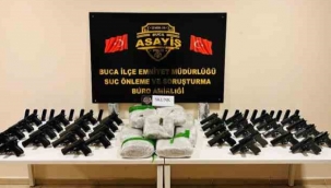 İzmir'de silah kaçakçılarının evinde 13 kilo uyuşturucu ele geçirildi
