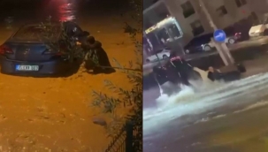 İzmir'de sağanak ve fırtına hayatı felç etti: Sel suları araçları sürükledi