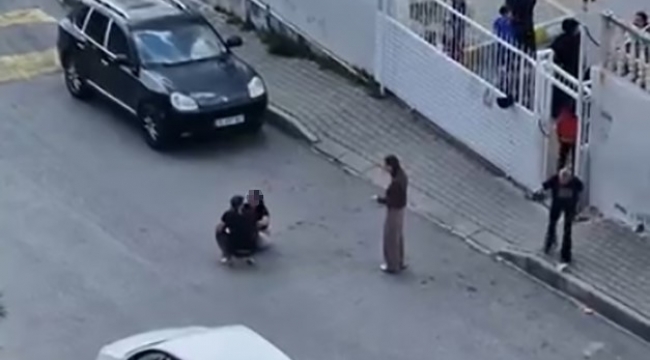 Sokak ortasında karısını dövdü, okuldaki çocuklar izledi
