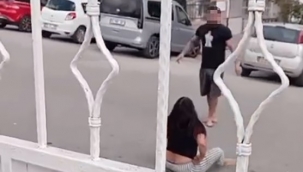 Sokak ortasında karısını dövdü, okuldaki çocuklar izledi